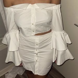 Selling a short white dress.